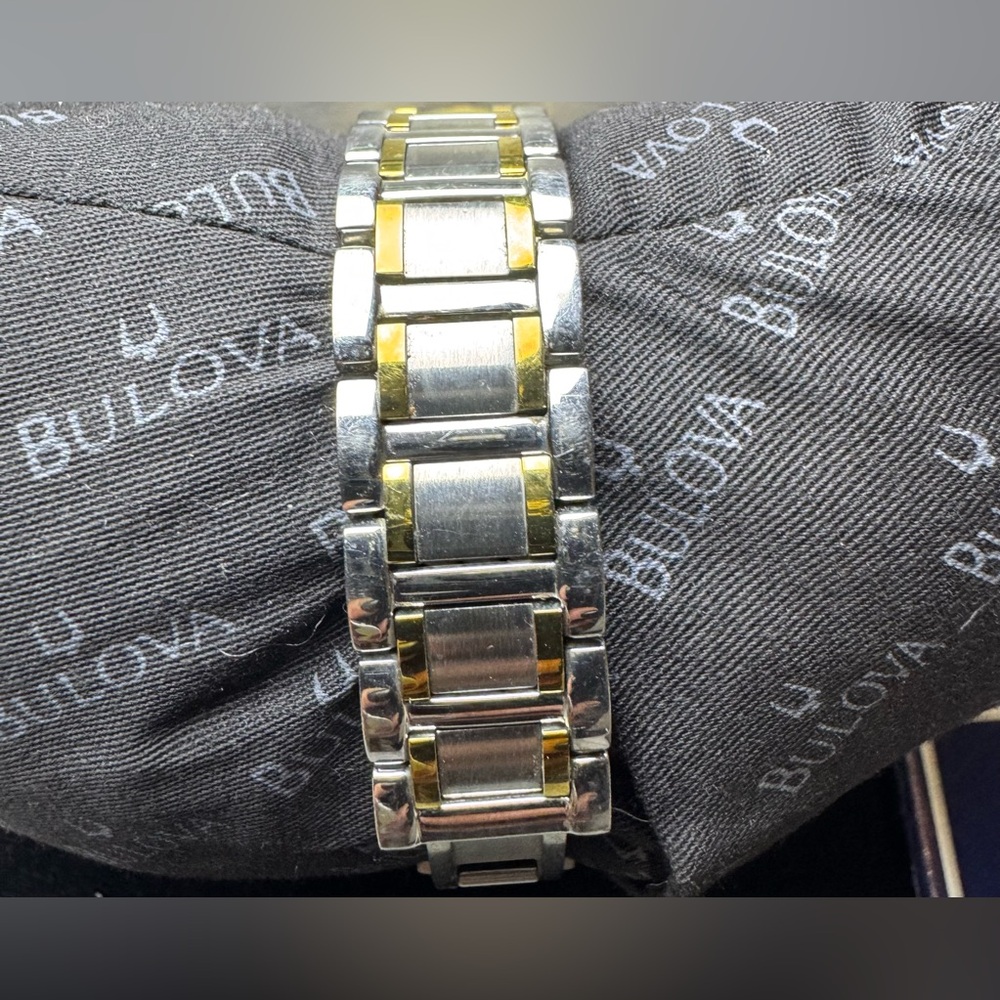 Bulova Two-Tone Stainless Mother of Pearl, Diamond Bezel Date Indicator Watch - Picture 9 of 15